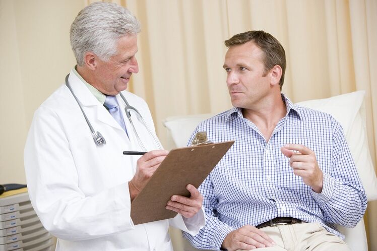 the doctor and the patient before the operation for penis enlargement